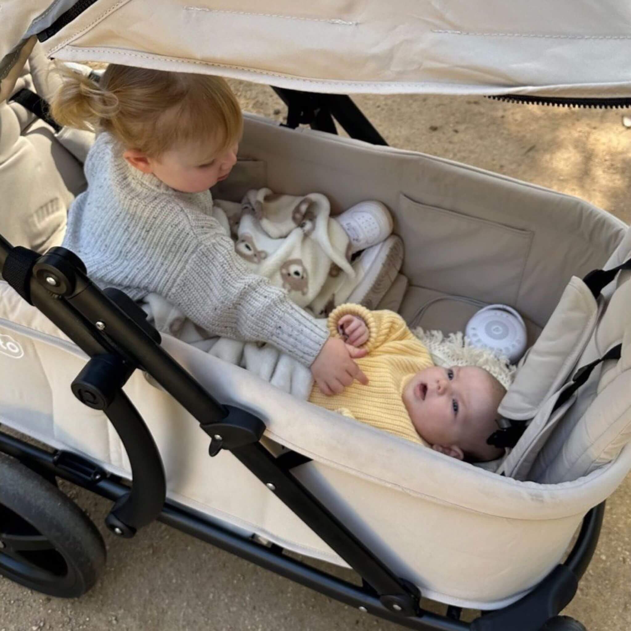 Toddler and child in a Pronto Stroller